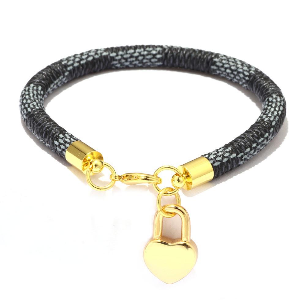 High-End Fashion Stripe Leather Bracelet with Gold-Plated Metal Accents