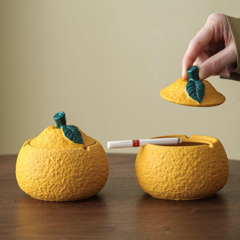 Resin Orange Ashtray with Lid - Creative, Anti-Fly, Stylish Living Room or Office Decor.