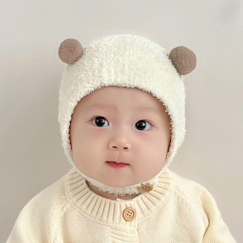 Super cute baby autumn and winter new children's thermal hat cute double ball hat warm ear protector knitted wool hat