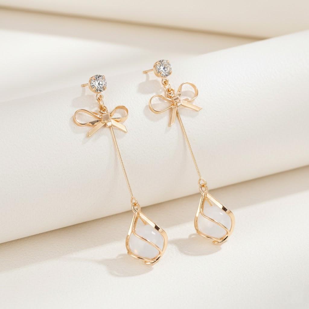 

Simple Bow Cats Eye Tassel Earrings for Women Long Hipster Accessories Fashion Jewelry Elegant and Versatile Gift Idea золотий