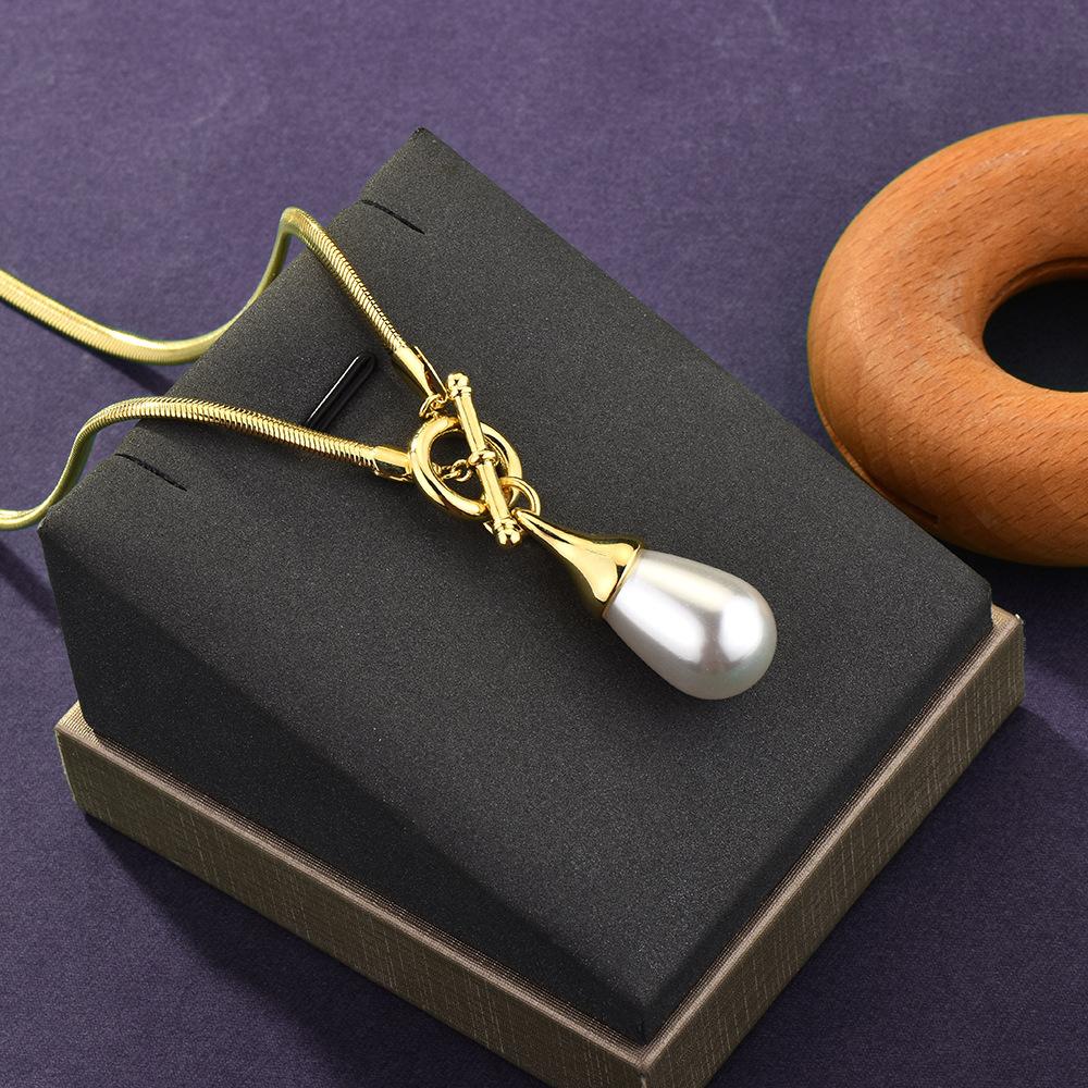 

Elegant Long Geometric Necklace For Women Featuring Unique Water Drop Pearls And Stylish Elements Metal золотий