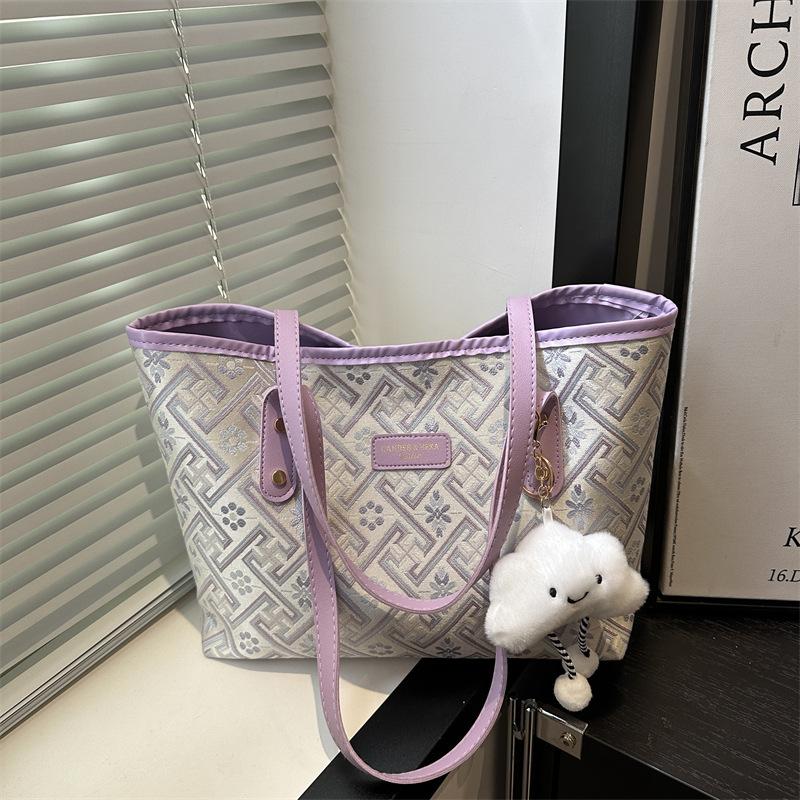 

Fashion large-capacity bag women s 2025 new commuter versatile shoulder bag summer popular portable tote bag single bag фиолетовый