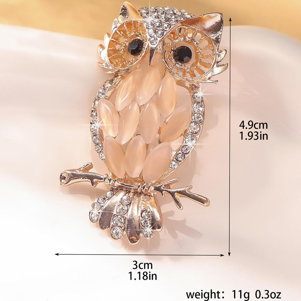 Cross border high-end owl fashion personality brooch with a sense of luxury, light luxury, diamond inlay, versatile chest flower
