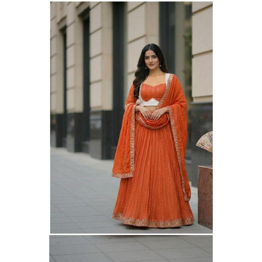 Lehenga Choli Presentiamo un lehenga in chiffon perfettamente miscelato per la stagione festiva per incantare il tuo look collezione 2026