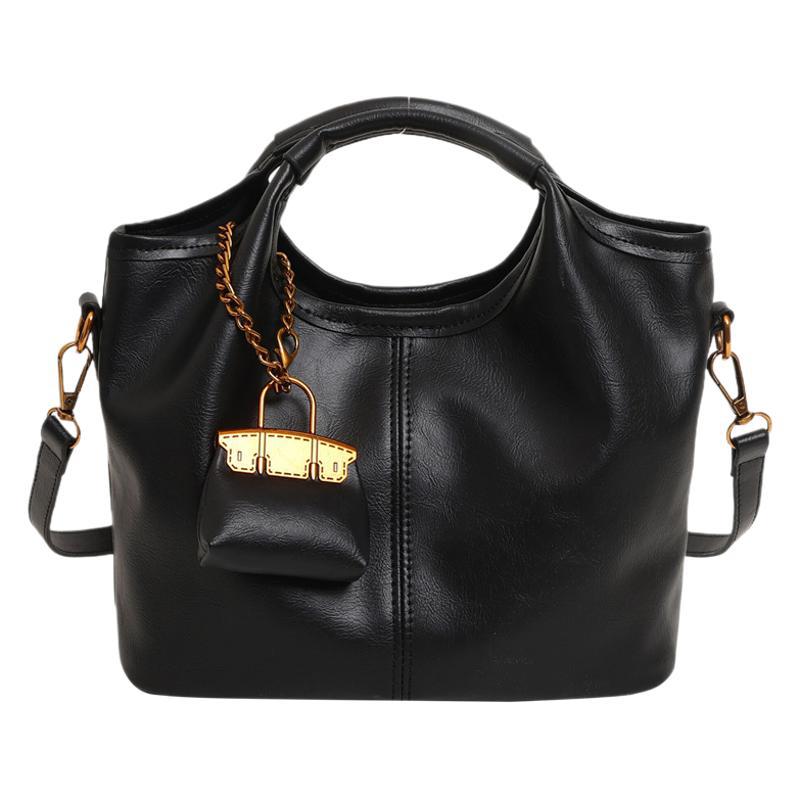 Retro niche handbag bag women's new high-end commuting large-capacity shoulder messenger bag mother and child bag