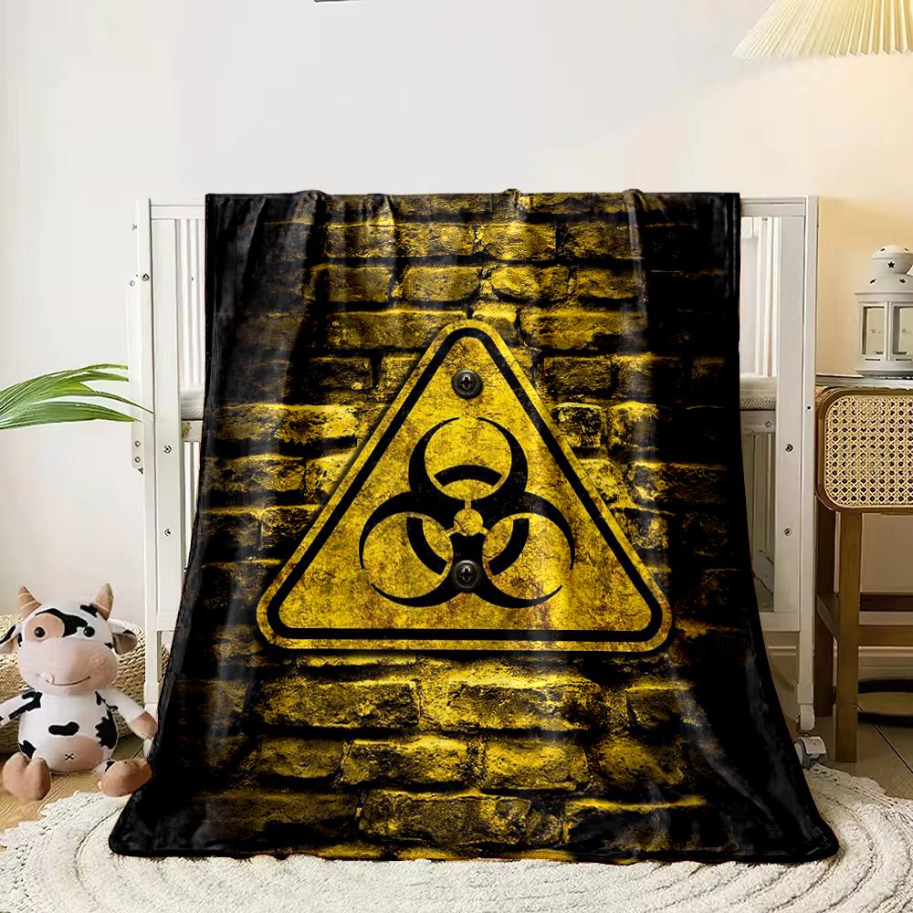 Biohazard Warning Sign on Yellow Brick Wall Flannel blanket for bedroom, living room, sofa, and nap sofas