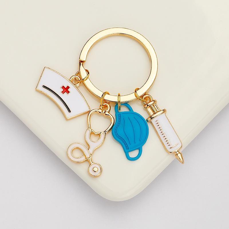 

Брелок для медсестры, металлический брелок для медсестры со шприцем, шапочкой для медсестры и стетоскопом для доктора, студента, медсестры, подарки