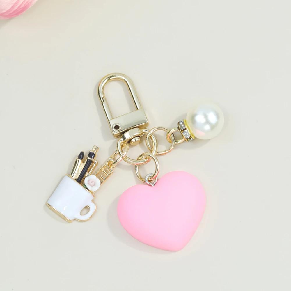 Bunte herzförmige Schlüsselanhänger mit Perlenstift-Behälter-Anhänger Schlüsselring Damen Geldbörsen-Taschen-Ornamente Auto-Schlüsselhalter-Zubehör