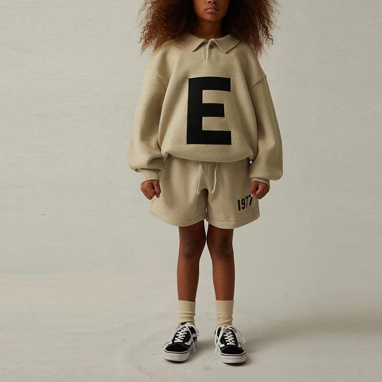 Fear Of God Essentials Kids Big E Knit Polo Sweatshirt Kids Tops Wheat FOG-SS22-164