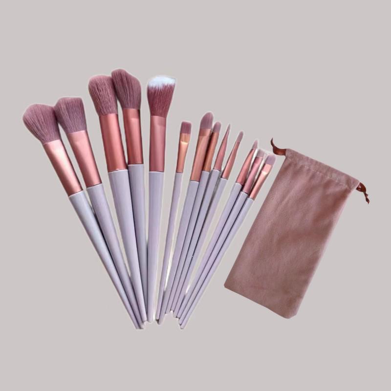 

Portable 13-Piece Makeup Brush Set: Includes Loose Powder, Blush, Eyeshadow, and Lip Brushes with Storage for Complete Makeup Tools.