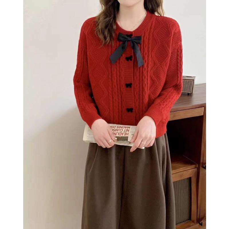 Solid color knitted cardigan women's new autumn and winter bow button with twist sweater jacket