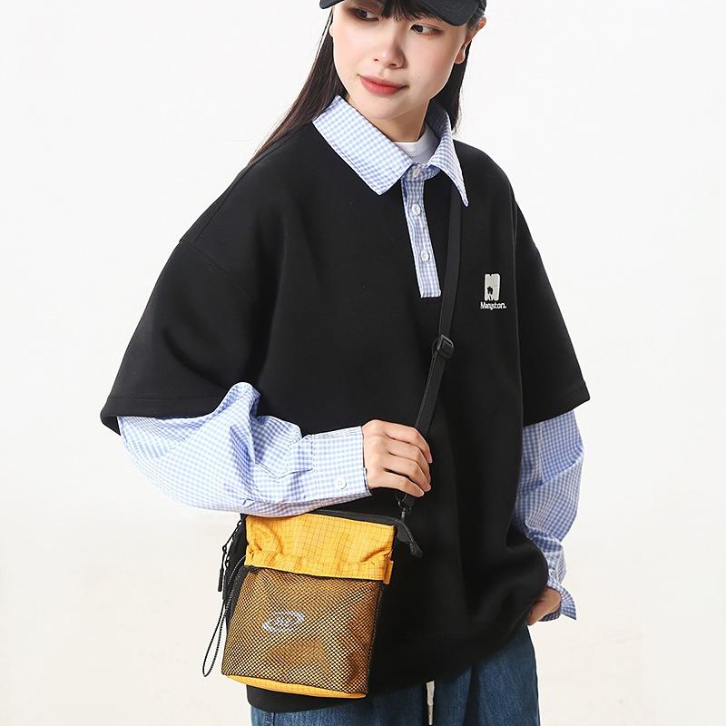 Casual messenger bag new fashion versatile commuter sports bucket shoulder bag women's mobile phone bag