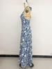 2026 Women's Summer Beach Halter Print Long Dress - Backless, Sleeveless, and Perfect for Vacation.