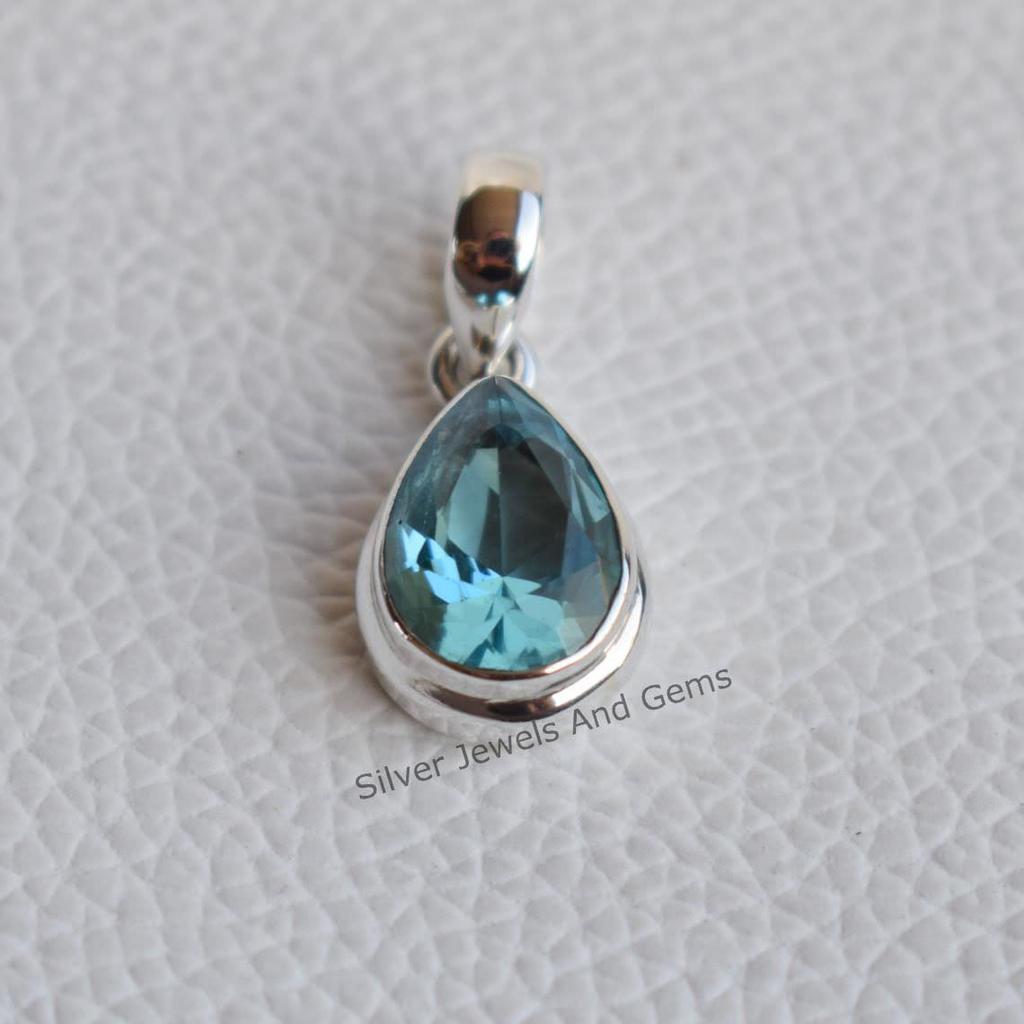 Handmade Teardrop Blue Topaz Pendant: 925 Sterling Silver