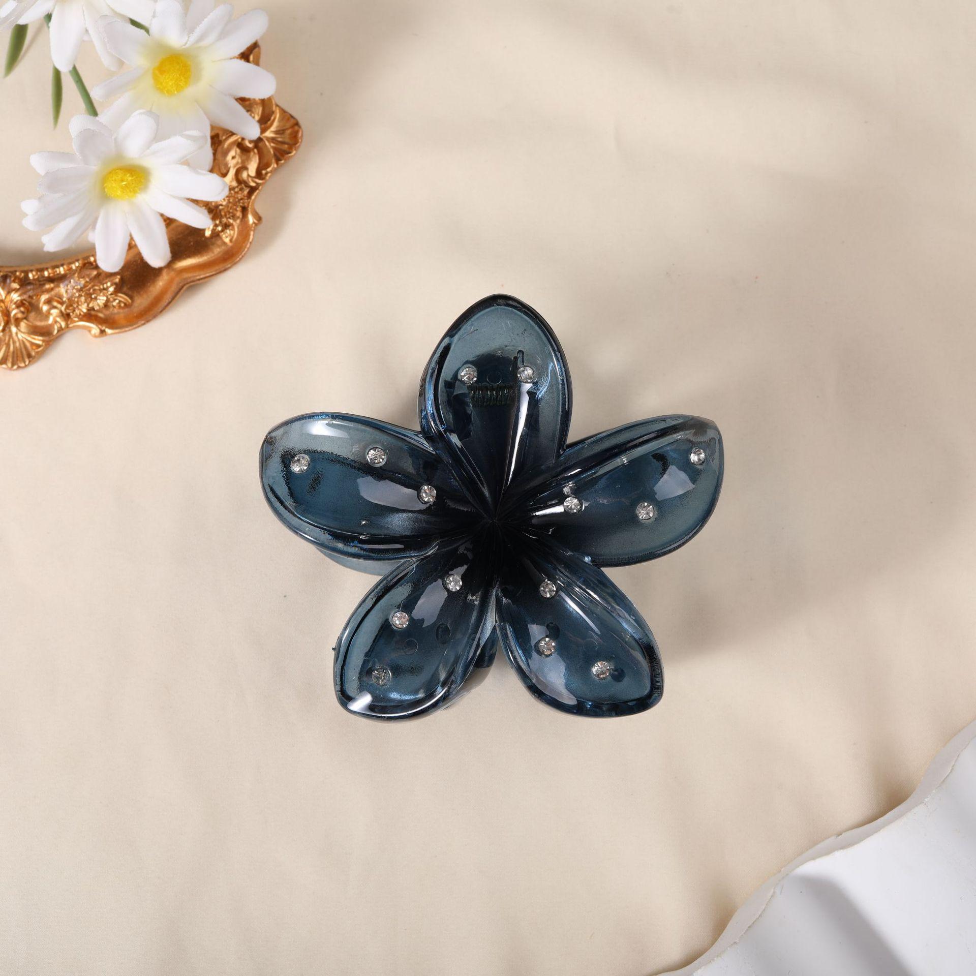 

Кліпса-краб Баухінія: Шпилька для волосся з кристалами у вигляді цукеркової квітки для жінок темно-синього кольору