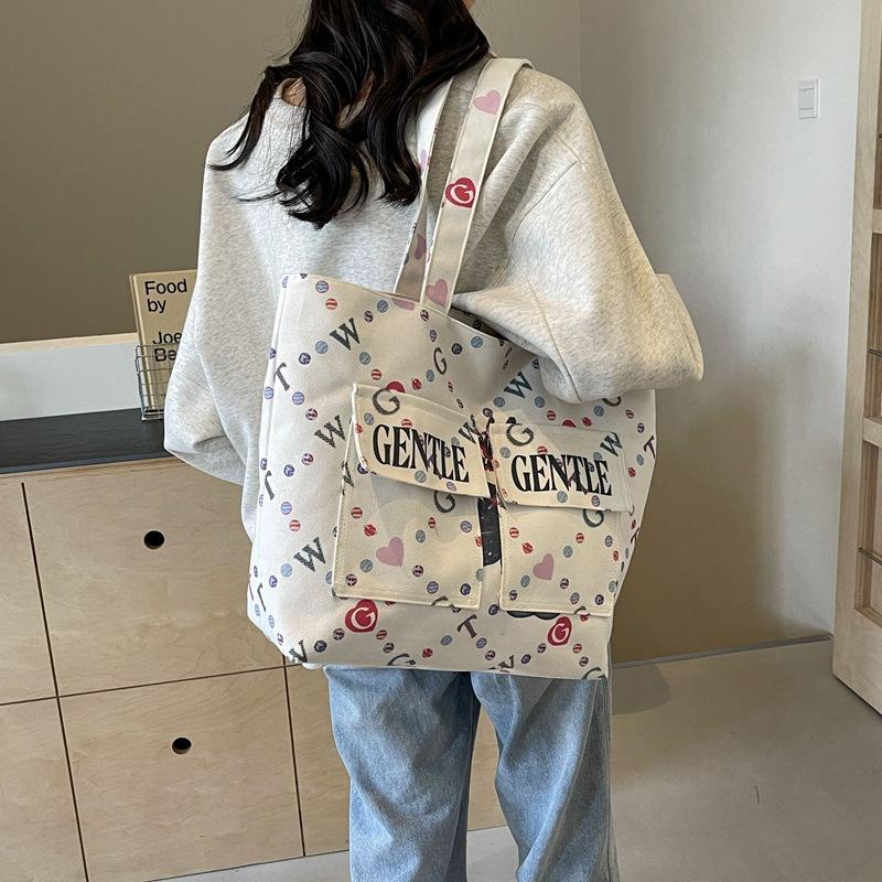 Large Capacity Canvas Bag Women's 2025 Spring and Summer New Fashion Letter Portable Shopping Bag Versatile Messenger Tote Bag