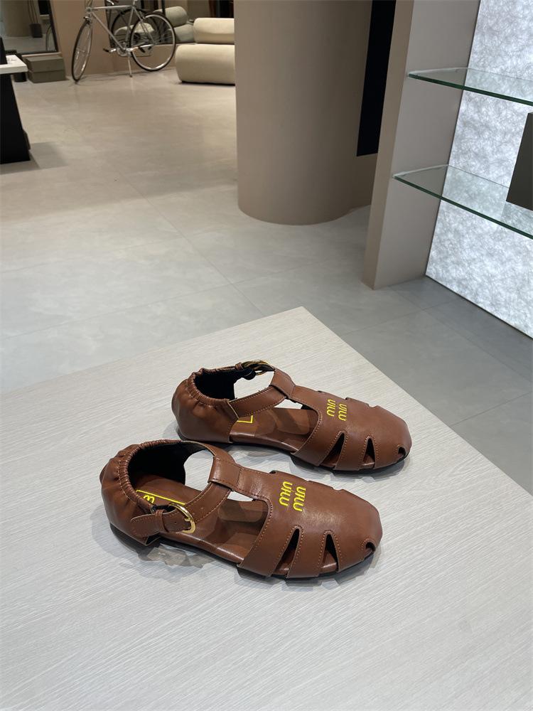 Baotou Roman sandals women's high new retro hollow versatile leather flat-bottomed casual pig cage shoes