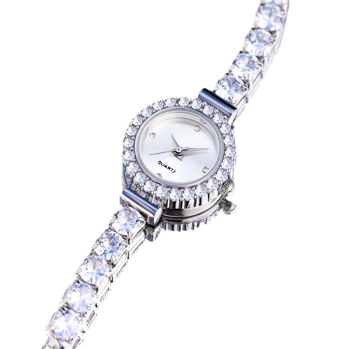 

Элегантные женские кварцевые часы-браслет с крупным бриллиантом и круглым циферблатом Green