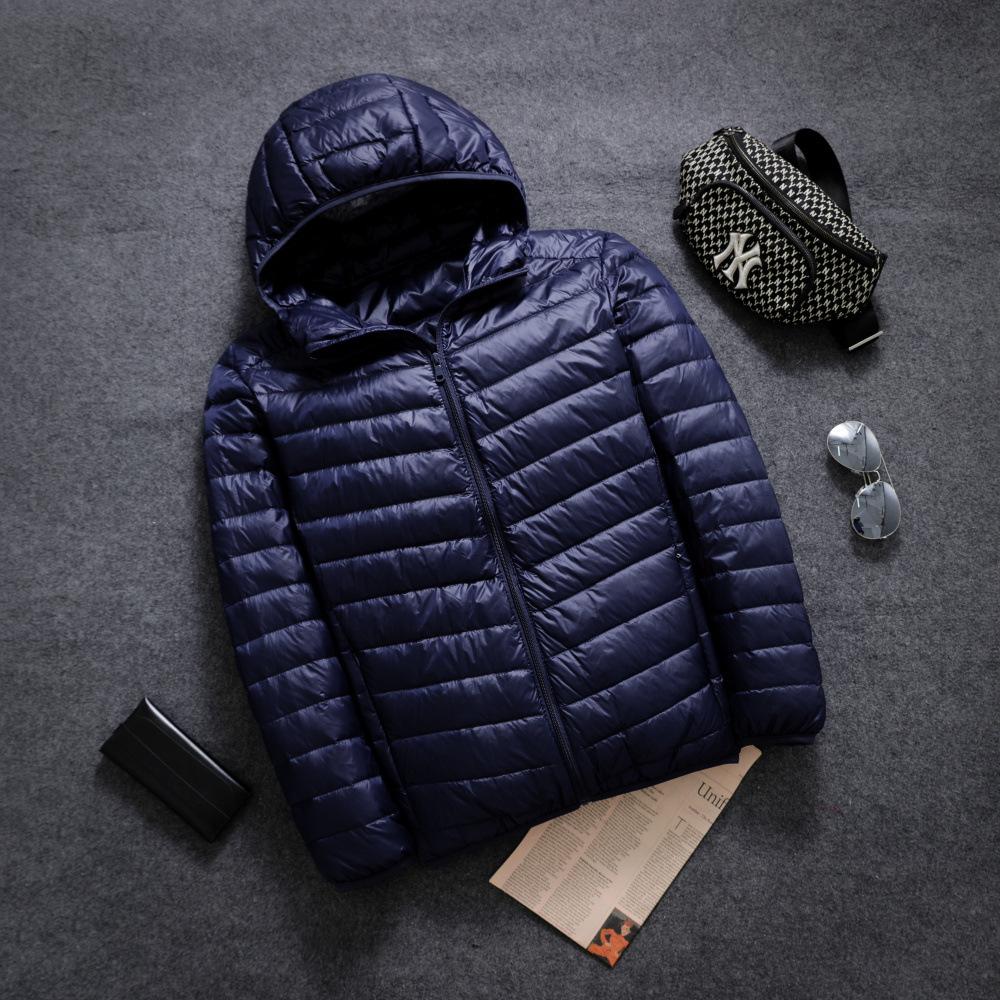 

Чоловіча коротка пухова куртка з капюшоном білого кольору, осінь/зима 2024 року - легка та тепла XL темно-синього кольору