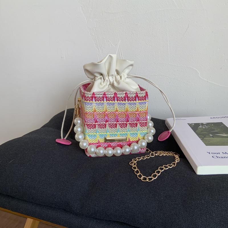 

Striped portable small bag women s 2025 new summer small fresh messenger bag foreign style hand carry chain bucket bag