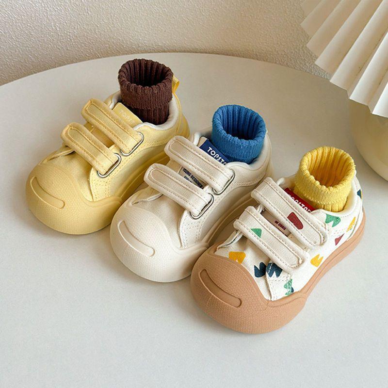 Children's open smile biscuit shoes spring and autumn new boys and girls ins board shoes soft sole versatile baby canvas shoes tide