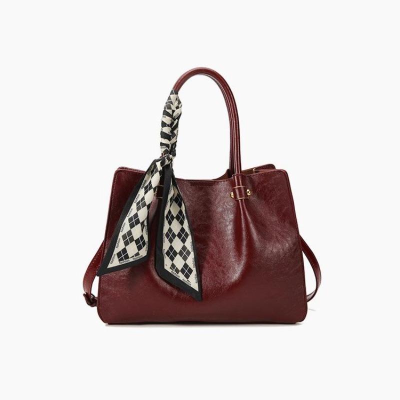 

Это уникальная ручная сумка-ведро в ретро-стиле и модная сумка для通勤 через плечо с одним плечевым ремнем. красный