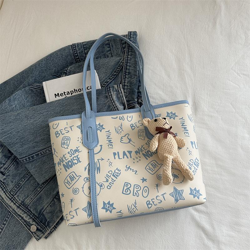 Einfache Temperament große Kapazität Tragetasche Damen 2025 Sommer neu kleine frische Druck Schulter Computertasche