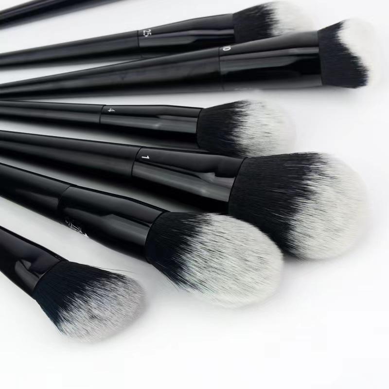 KVD Big Face Full Makeup Brush Set: 3D Concealer, Foundation, Double-Ended Eyeshadow, Loose Powder, Blending, and Setting Brushes.