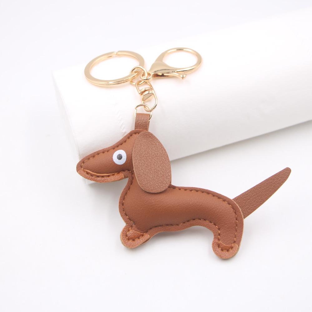 

Подвеска-брелок из искусственной кожи в виде таксы: Стильный аксессуар в виде щенка для сумок и машин. Dachshund