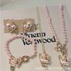 Queen Mother West's New Pink Pearl Love Pin Saturn Bracelet, Necklace, Earrings, Sweet Temperament Heart Shape