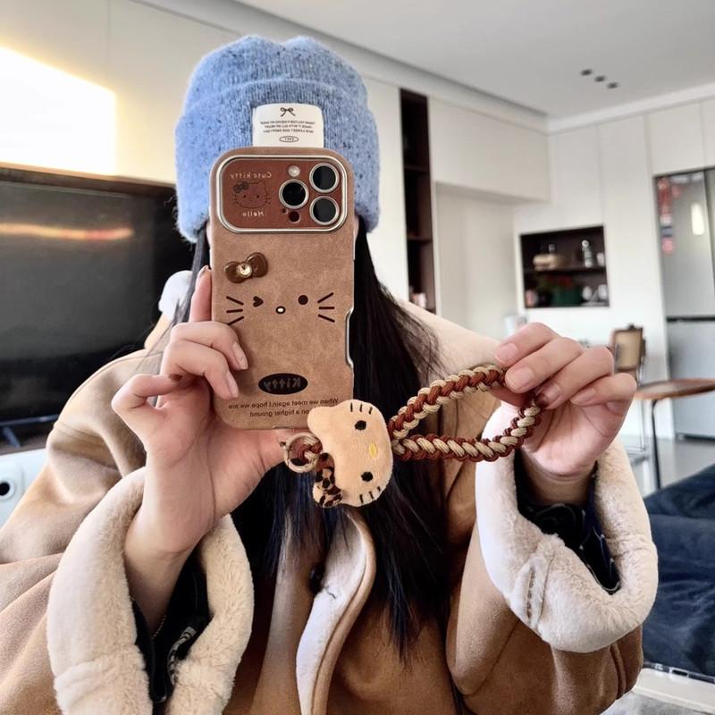 MINISO Hello Kitty Phone Case For iPhone 16 15 14 12 13 11 Pro Max Brown Retro Artificial Leather Cover With Hand Strap