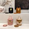 Summer new niche fashion contrasting color M bear rice bucket bag portable shoulder women's bag