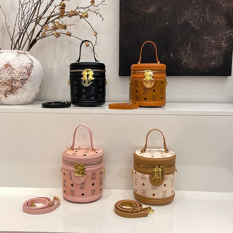 Summer new niche fashion contrasting color M bear rice bucket bag portable shoulder women's bag