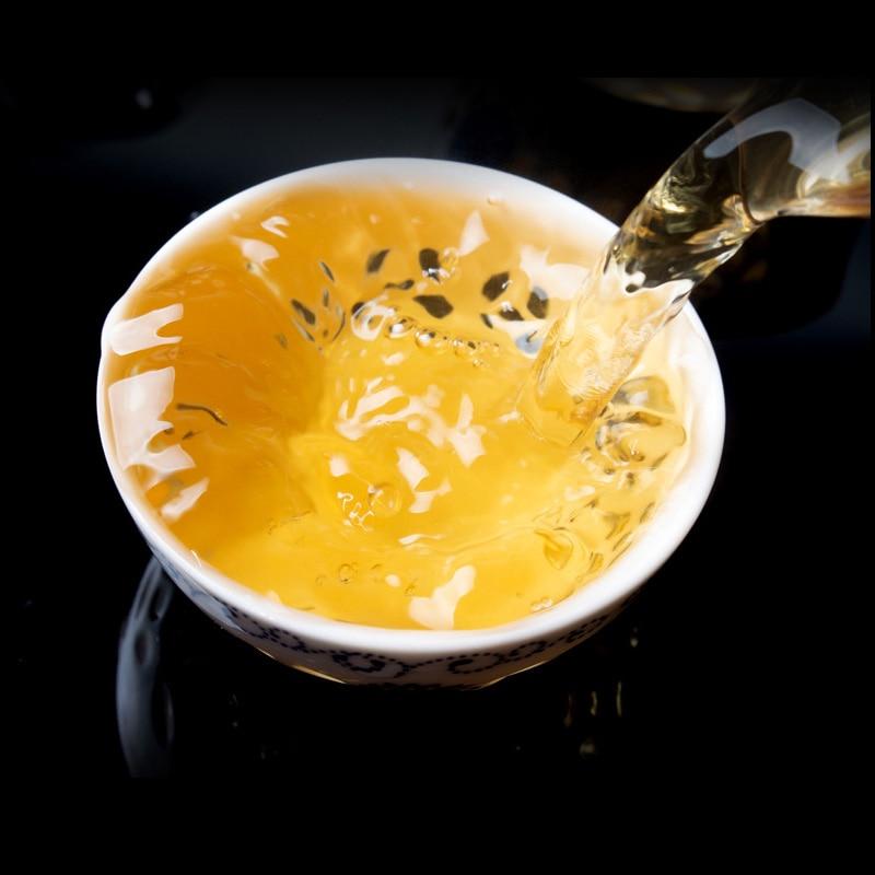 2018 Yiwu Sheng Puerh Tea Qizi Ancient Tea Tree with Honey Orchid Floral Scent Raw Puerh Tea 357g