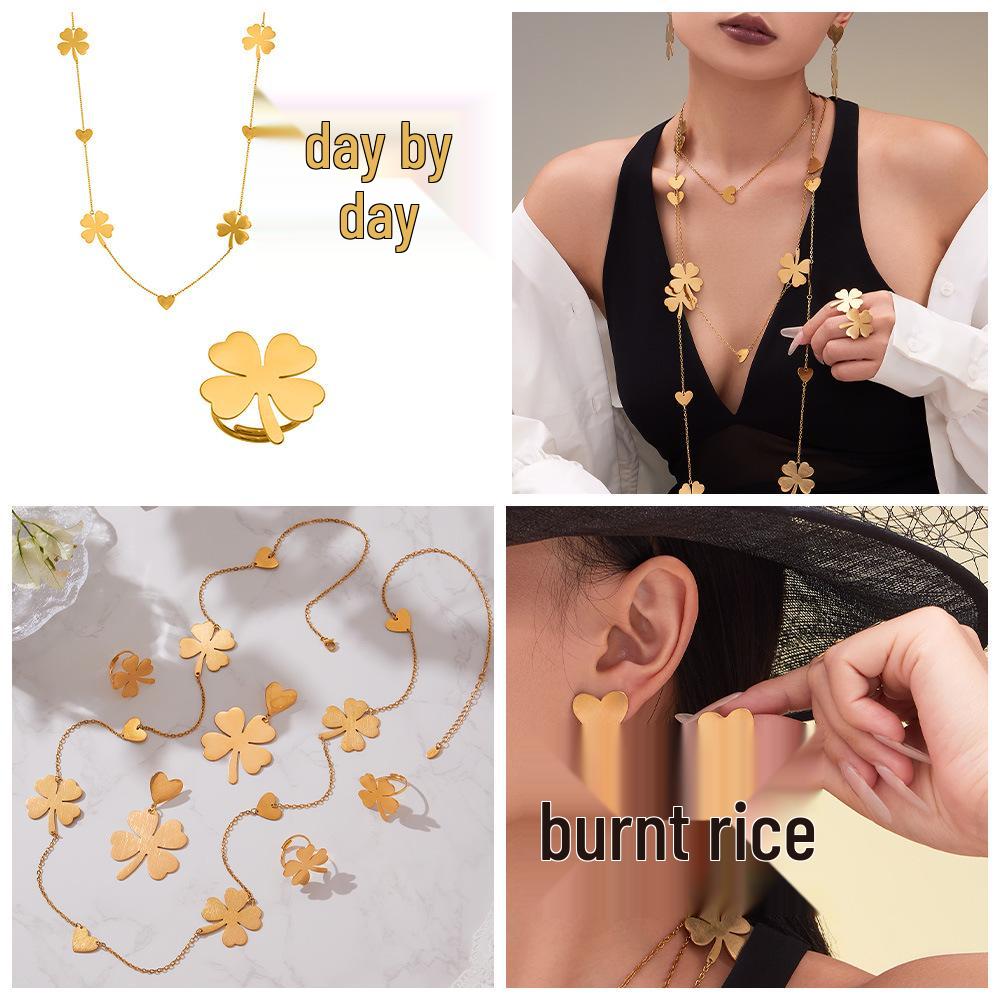 Oumeka 18k Gold-Plated Stainless Steel Jewelry Set: Heart & Four-Leaf Clover Earrings, Ring, and Necklace.