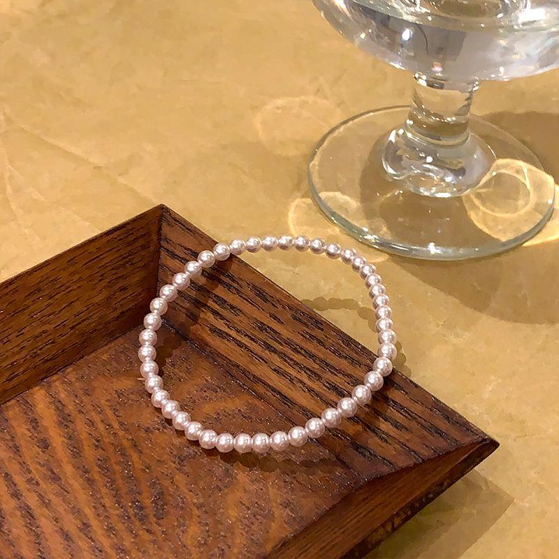 

Браслет в корейском стиле с шариком из страз и жемчуга, двухслойный, женский, легкая роскошь, нишевый, необычный браслет, с двойным ремешком для ношения, аксессуары