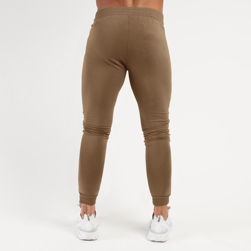 Frühling und Sommer Neue einfarbige Fitnesshose Lässige elastische Sporthose Herrenmode