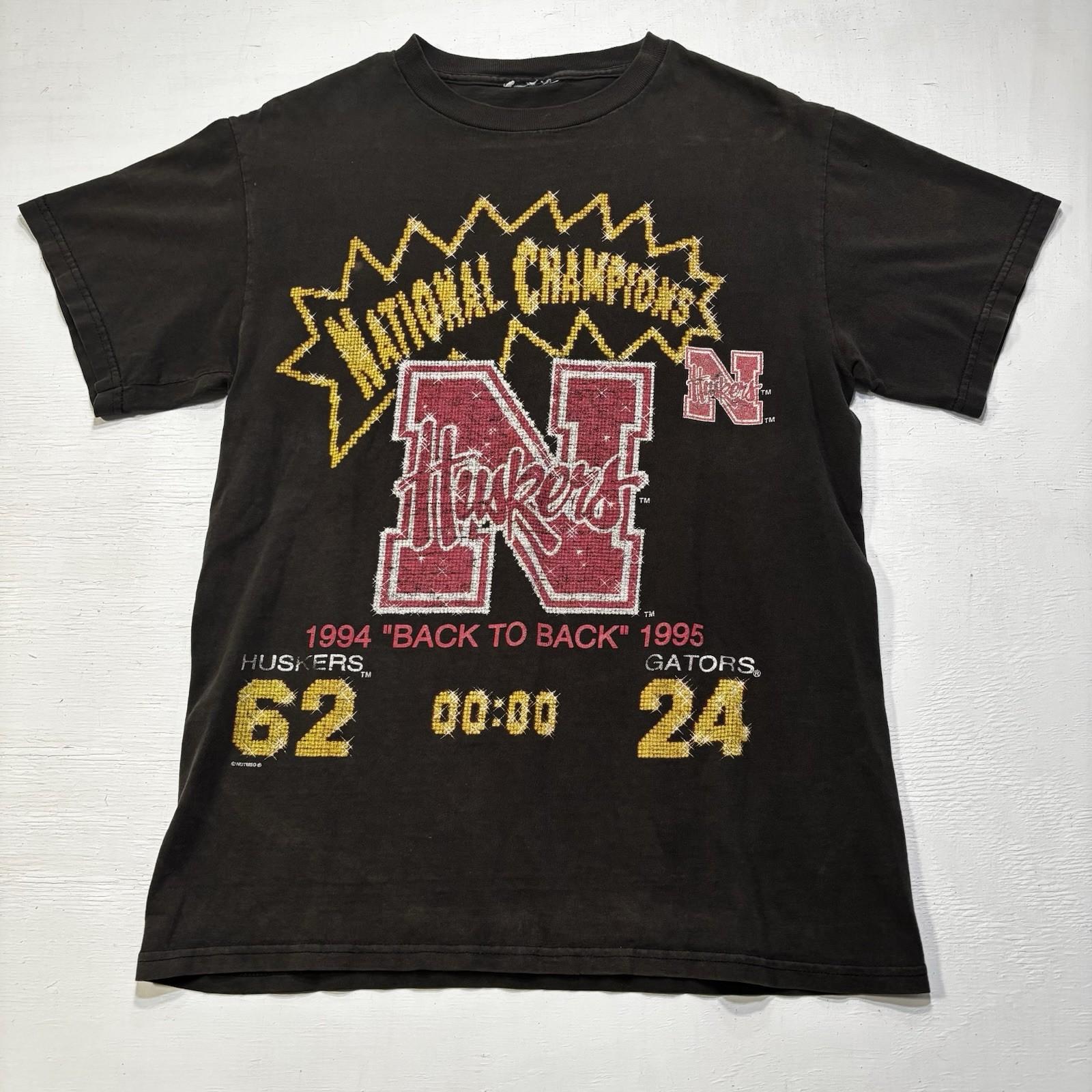 vintage 1994-1995 Nebraska Cornhuskers National Champions t-shirt Faded Black Unisex T-Shirt M