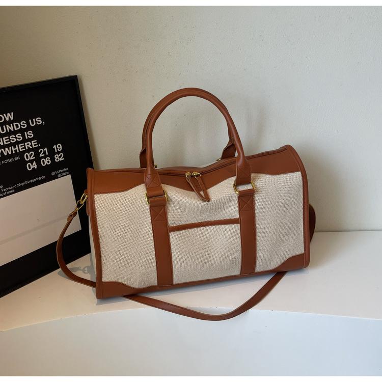 Large capacity contrasting canvas handbag women's bag 2025 new commuter travel bag simple casual shoulder crossbody bag