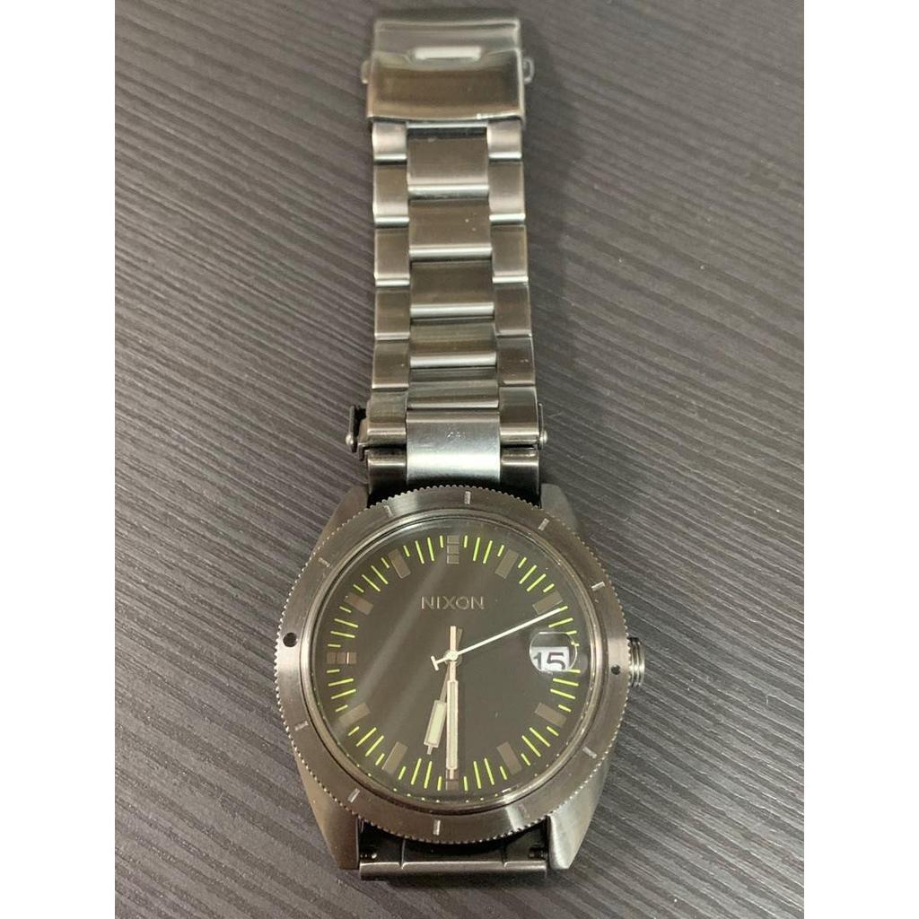 Used NIXON analog watch metallic black