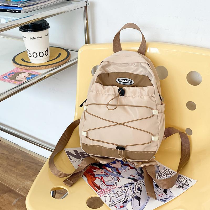 Outdoor travel bag mini fashion small backpack new Korean light boys and girls backpack junior high school hiking bag