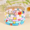 Korean version of fashion new multi-layer elastic thread soft pottery love smiley face bracelet set retro handmade pearl jewelry women