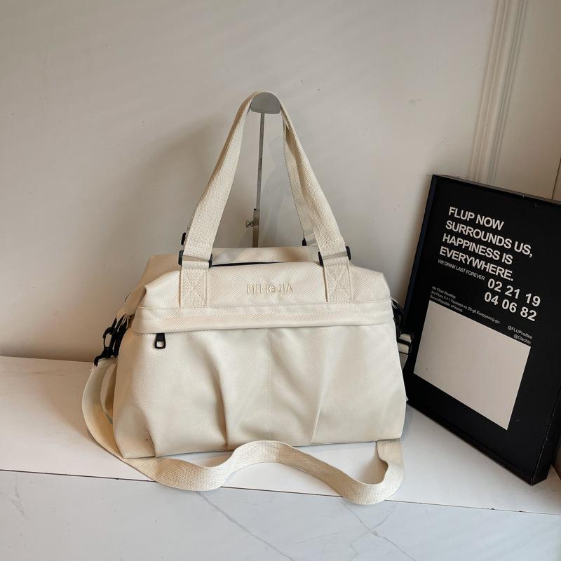 High-value short-distance travel bag women's new trendy and textured business trip duffel bag simple large-capacity sports fitness bag