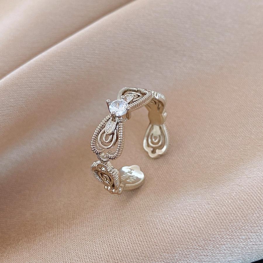 Korean zircon bow iris flower opening ring ring ring design sense jewelry women