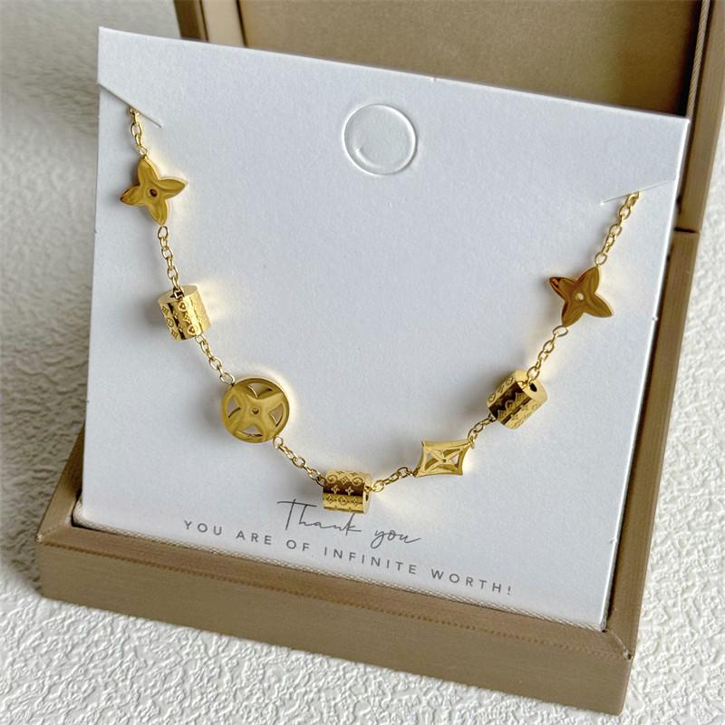 Lätt Lyx Fyrklöver Hand Smycken Avancerad Känsla av Dubbelsidig Fyrklöver Armband Kvinna Enkelt Lätt Lyx Temperament Armband