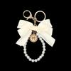 Bowknot Keychains Women's Pearl Chain Big Bow Tie Tote Hanging Ornament Bag Decorations DIY Headphone Case Accessories Kit Chain