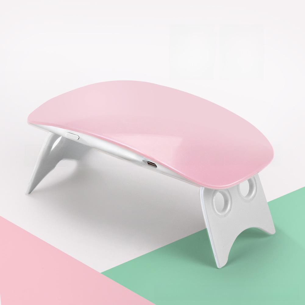 

Набор инструментов для французского маникюра с разноцветными блестками, в который входит подсветка-мышка, набор накладок для ногтей, поднос и кусачки.