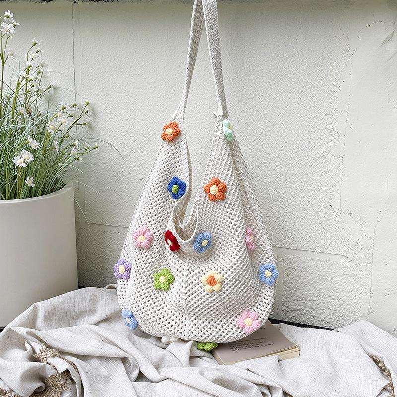 

Woven bag women s new shoulder tote bag lazy wind knitted hollow flower beach bag off білий колір