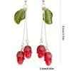 Gothic Skull Earrings in Fashionable Red Vampires Skull Style with Green Leaf Details for Fashion Forward Women