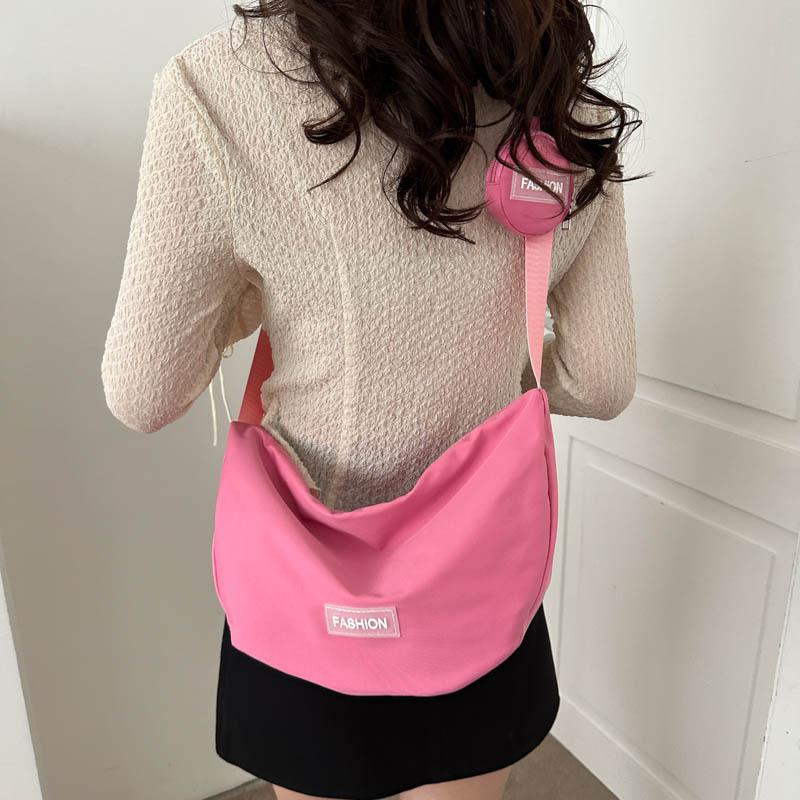 Fashionable And Minimalistic Dumpling Bag For Women Spacious Shoulder Bag Available In Black White Green Red Orange And Pink